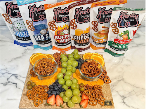 Knotty Pretzels flavor lineup with charcuterie-style spread