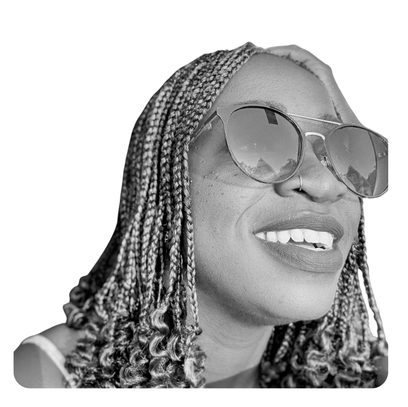 Ceva Brown smiling in sunglasses